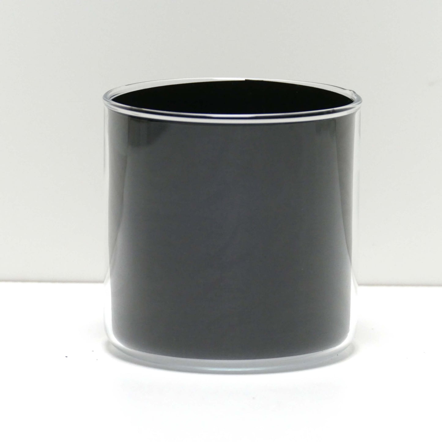 Pot motifs noirs et sa plante
